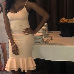 Light blush pink strappy flute hem midi dress